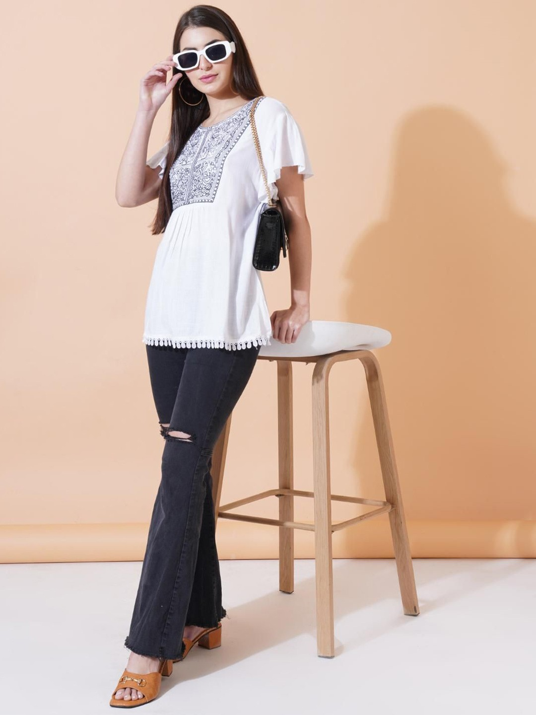 Women Embroidered Flared Sleeve A-line Top